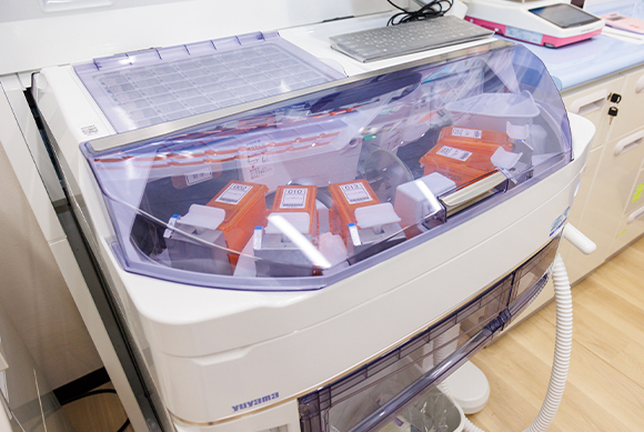 自動秤量機能付き散薬分包機